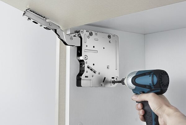 Kitchen Cabinet Television lift being installed