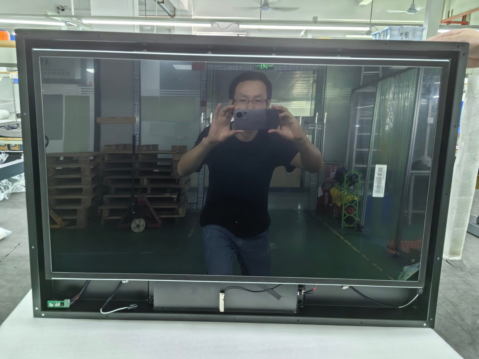 Custom-built Magic Mirror TVs are hand-built in our workshop