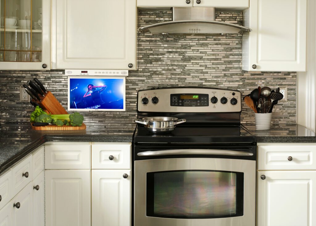 A flip down kitchen TV