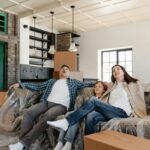 Family in living room shocked at what they see